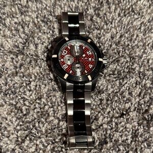 Invicta Black and Silver Watch Red Accents